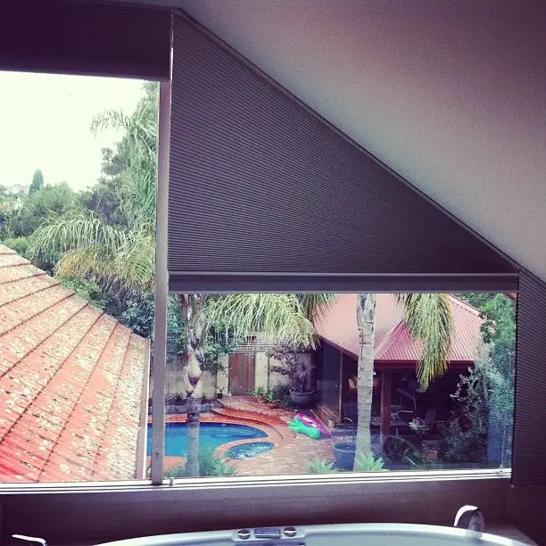 View our tailored Honeycomb Blinds for Melbourne's unique triangle windows. Custom solutions by IndesignBlind.