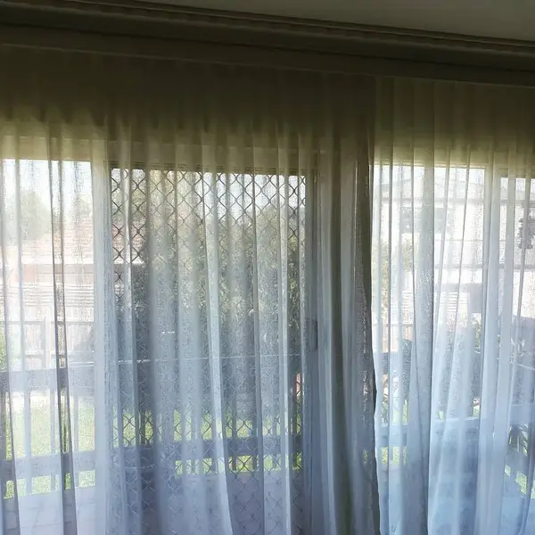 Wall to wall, floor to ceiling sfold curtains | InDesign Blinds Wall to wall, floor to ceiling sfold curtains