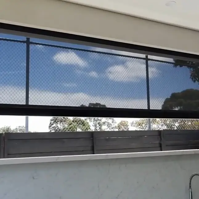 Outdoor motorized roller blinds by IndesignBlind bring style and functionality together.