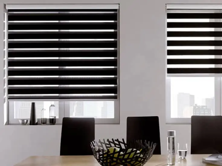 Zebra roller blinds are made of one continuous piece of fabric that combines translucent sunscreen and solid blackout strips.